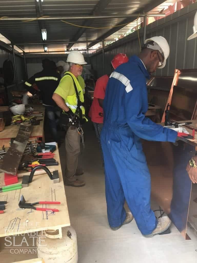 consulting with workers in trinidad while working on the red house