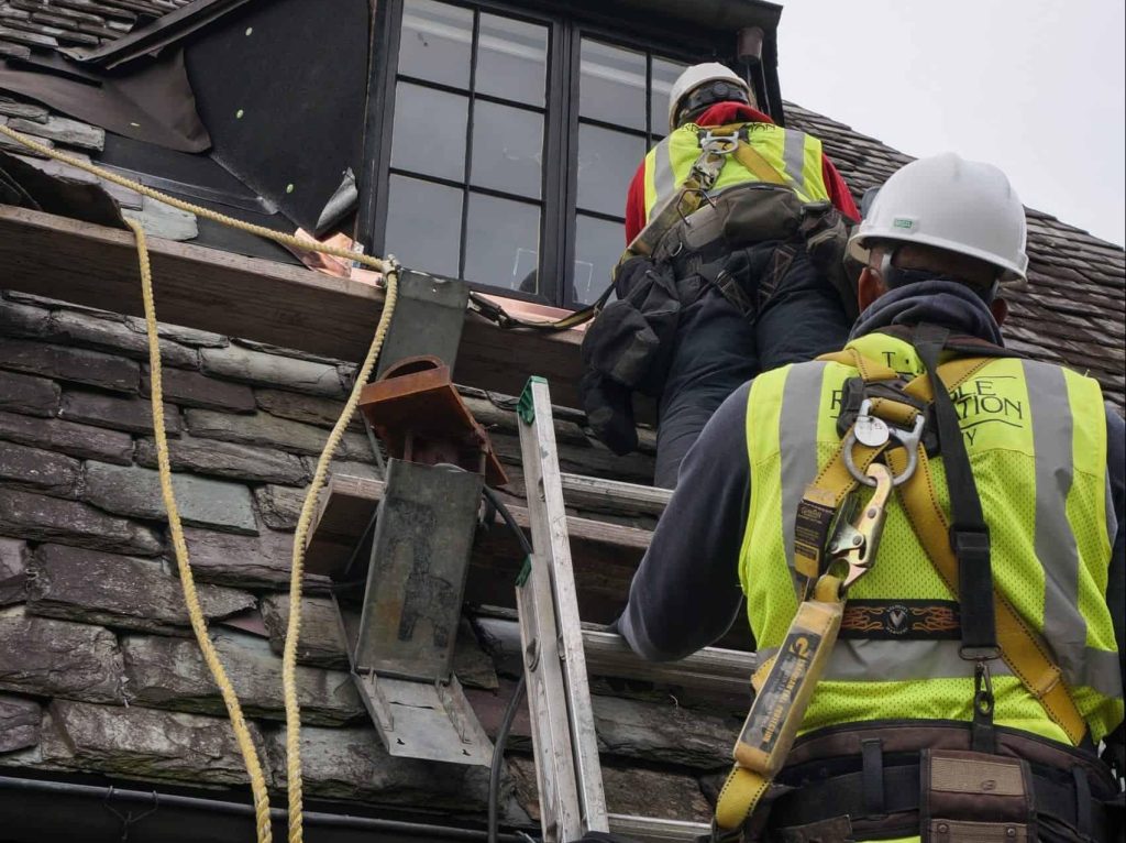 durable slate staff exemplify proper climbing safety gear