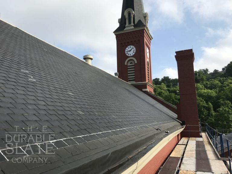 west view of st rose of lima church and tower, including the slate roof and copper flashing