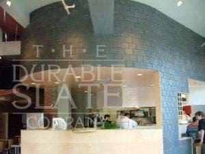 We installed new slate as a decorative wall cladding.