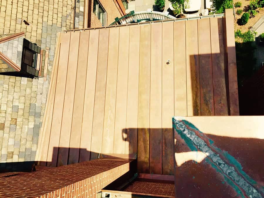 the ivy hotel new flat panel roof being installed