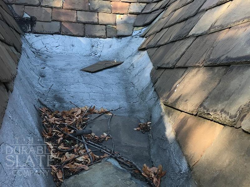 tarred bitumen roof trough with leak