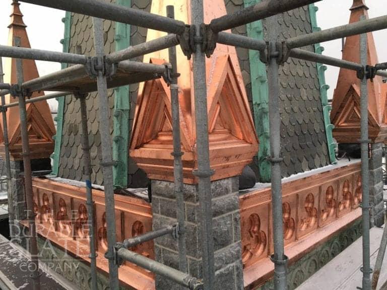 ornamental copper spires on church roof