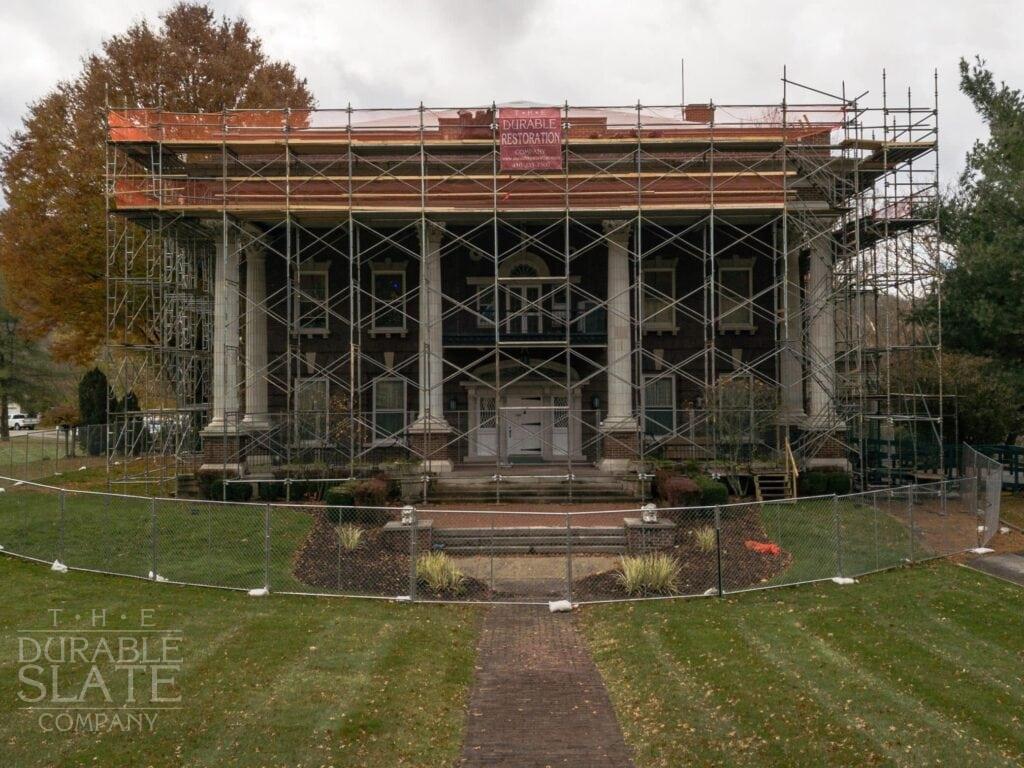 clay-tile roof repair underway for the stifel fine arts center in wheeling west virginia