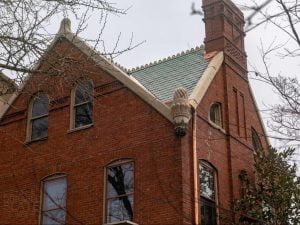 the gibson-todd house in charleston, west virginia, with freshly repaired copper gutters and copper flashing