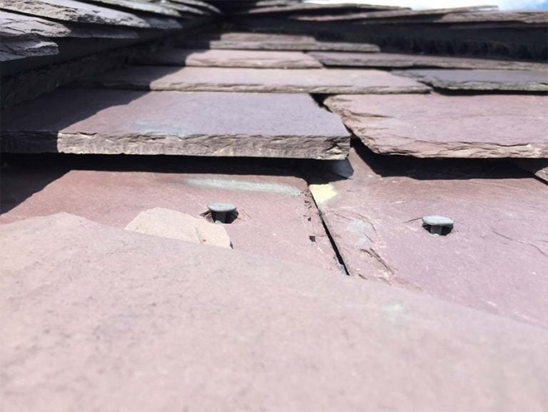 another example of a badly installed slate roof that needs to be repaired properly