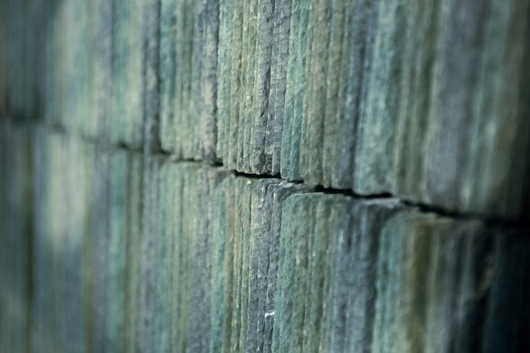 a close up of a wooden fence