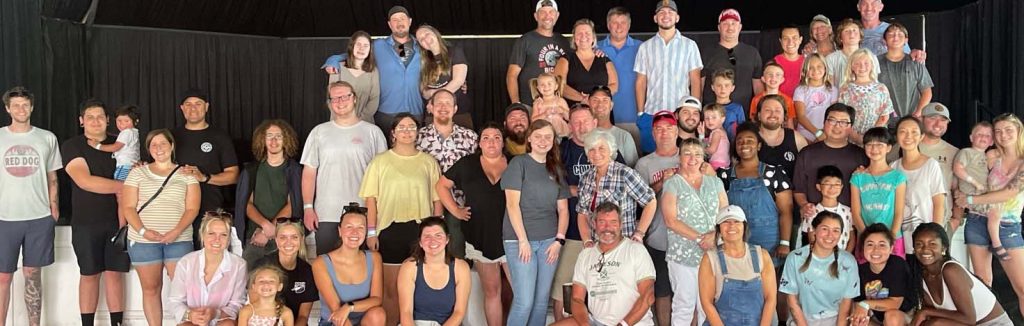 a group of people posing for a photo